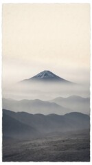 Fototapeta premium Mountain peak photo landscape, snow-capped volcano rising above misty fog and rolling hills at dawn