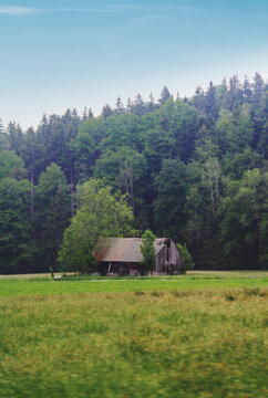 Vertical countryside landscaped, old antique house in rural Europe