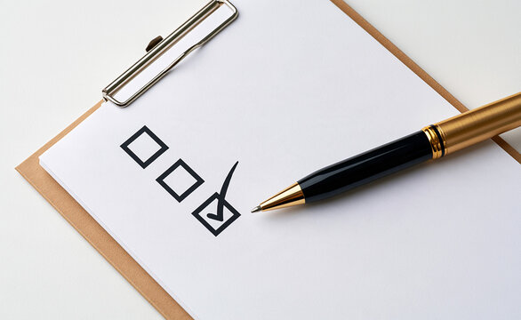 Checklist with checkboxes and pen on clipboard, business