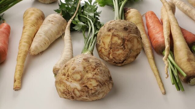 zoom winter vegetables celery carrot on ligt surface food
