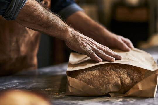 hands kneading dough