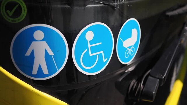 Sign indicating accessibility options for people with disabilities and strollers