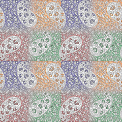 Seamless repeating pattern with paisley motifs placed at different angles, balanced by smaller floral elements and filler © Venkatsai