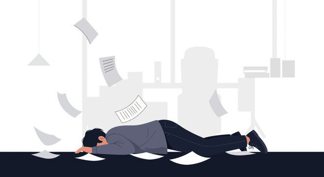 Exhausted businessman face down on office floor surrounded by flying papers