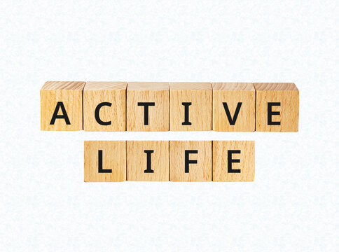 Active life wooden letter blocks on blue pattern background image.