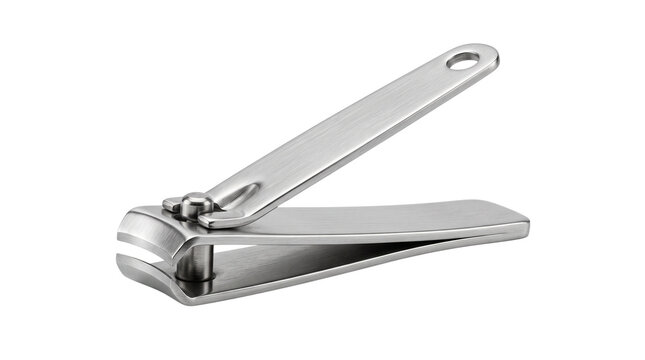 Stainless steel nail clippers on white background, professional manicure tool for personal grooming, metallic finger nail cutter for hygiene