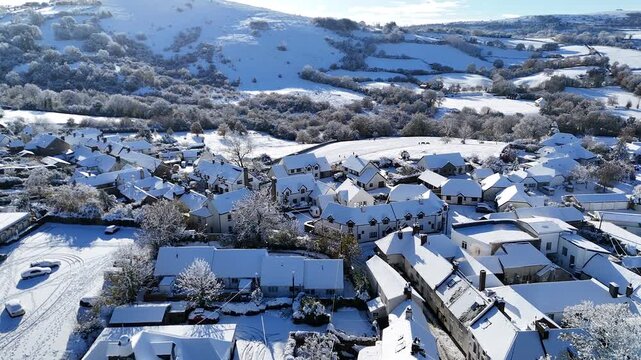 Snowy Chagford Village and Rolling Hills Aerial