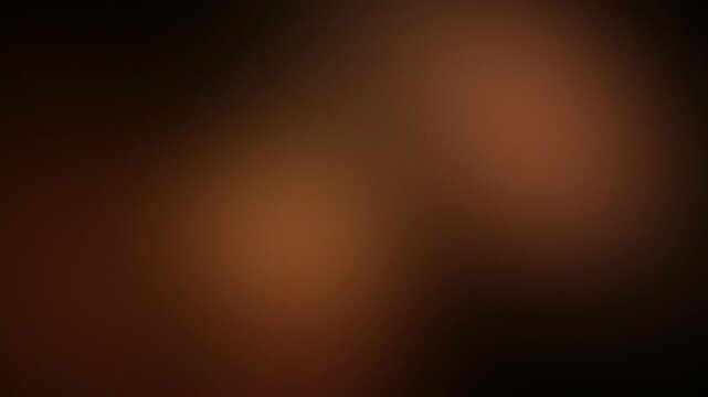 Soft glowing copper, rust and espresso brown lights drifting on dark background, seamless abstract gradient loop for coffee, autumn and warm lifestyle content