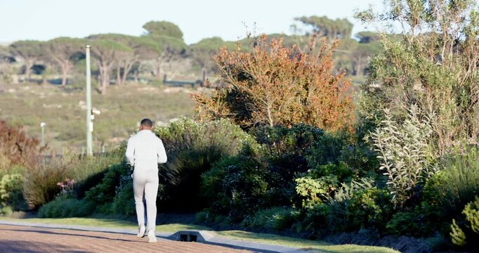 Lifestyle videos outdoor of people doing activities, jogging on scenic path, man enjoying outdoor ex