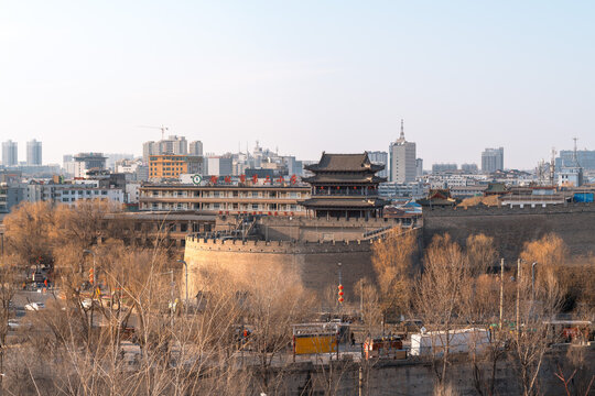 Ancient City Wall and Gate Tower with Modern Skyline in Xi'an, China