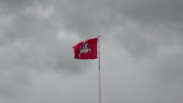 Historical state flag of Lithuania with Vytis knight emblem in Kaunas city
