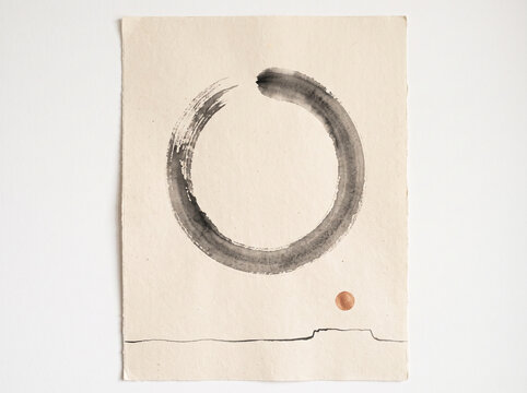 Zen ensō circle ink painting with copper dot and earth line on textured paper art.