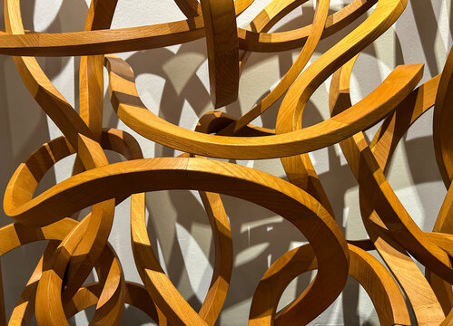 Wooden sculpture from the spaghetti or loops series. Close-up.