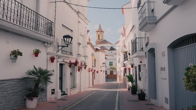 Narrow Whitewashed Street in Estepona Old Town Spain