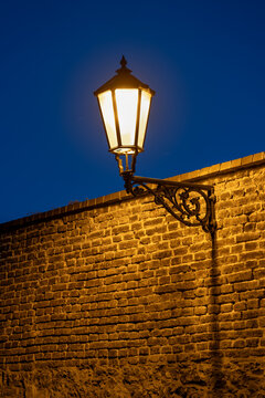 Vintage Lamp On Brick Wall At Night
