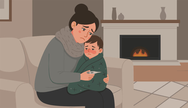 Devoted mother sits in a comfortable chair holding her sick child who is wrapped in a green blanket near a warm fireplace during a cold season.