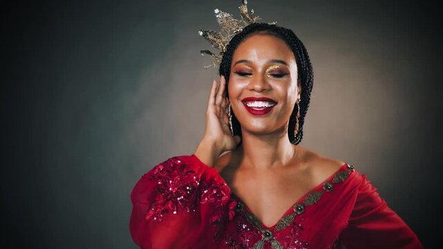 Portrait joyful happy fantasy african american woman princess, clapping hands smiling face open mouth red lips. Queen girl shout surprised emotions joy news. Carnival costume dress crown. gray studio