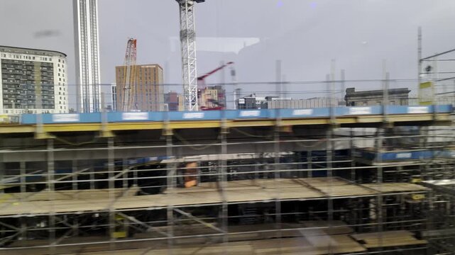 HS2 Curzon Street Station Construction Site in Birmingham, UK.
Construction of HS2 Curzon Street Station viewed from a moving West Coast Main Line train travelling towards London.