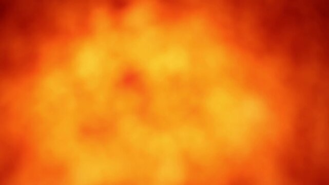 Una toma de cerca de un fondo abstracto de color anaranjado con un degradado ligero desenfocado en movimiento
