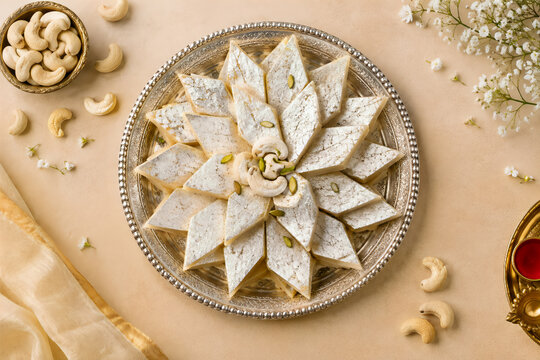 Kaju Katli Diamond Cut Sweets Overhead Silver Tray