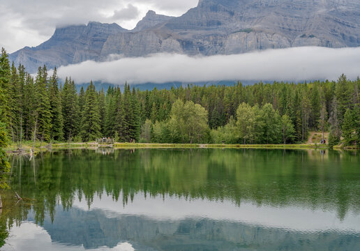 Cloud covering Mount Rundle and Johnson Lake in Banff National Park, Alberta, Canada