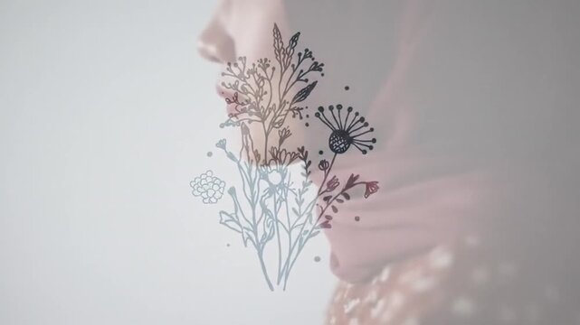 Woman walking past a minimalist botanical line art drawing on white wall