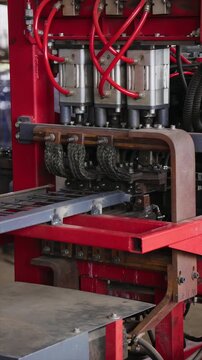 Pneumatic cylinders and welding electrodes of a steel mesh welding machine at a factory