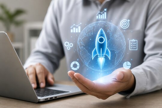 Person working on laptop with hologram rocket launch and startup business growth icons floating
