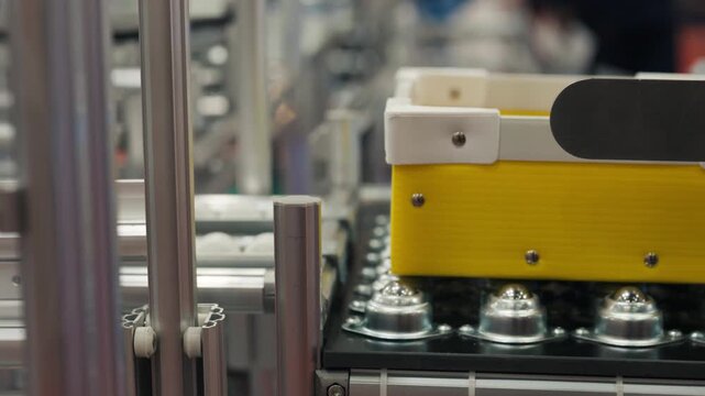 Automated cardboard box packing machine working in high-speed distribution hub.