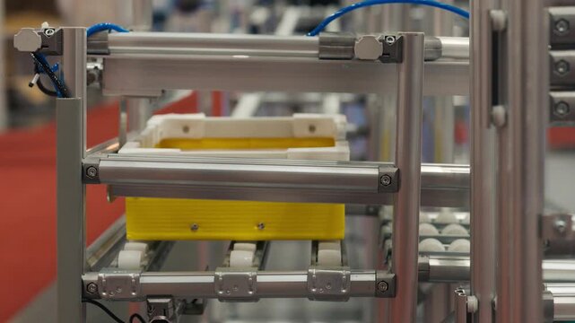 Point of view shot of automated guided vehicle delivering merchandise in warehouse.