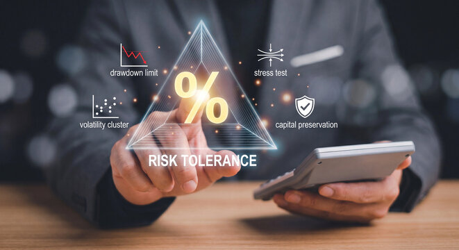 Businessman touching a digital hologram of a percentage sign representing risk tolerance with financial analysis icons
