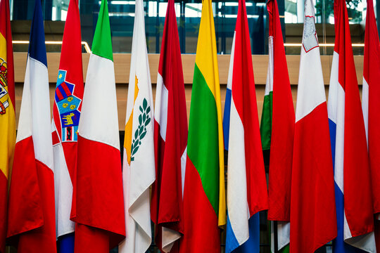 Close-up view of colorful national flags representing European countries, symbolizing international relations, cultural diversity, unity and cooperation across Europe.