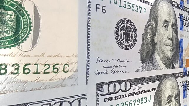 Fluid movement across arranged 100 dollar bills shaping an exclusive business backdrop that highlights investment potential, financial assets, monetary exchange and continuous cash flow