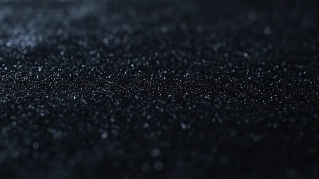 Fine white powder spread across a dark surface with a scraper tool in a macro close up view