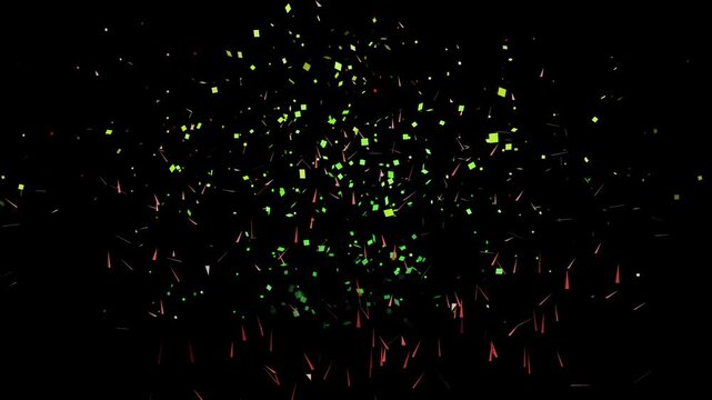 Festive celebration background with colorful green and red confetti falling isolated on a black background