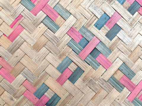 Close-up photo of a woven bamboo fan 