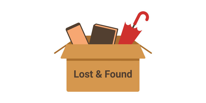 Cardboard box labeled Lost & Found with umbrella book and phone for storage or misplaced items collection.