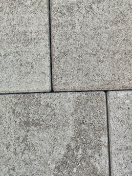 Close up of melange concrete blocks in running bond pattern
