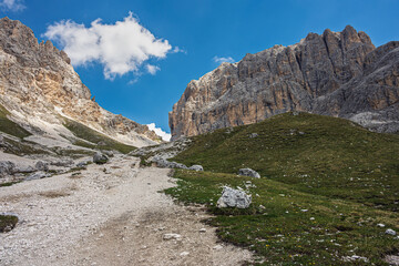 Fototapeta premium mountain landscape inside the Catinaccio Mountain Range along the trail to get to the Lake Antermoia, Val di Fassa, Dolomites, Italy