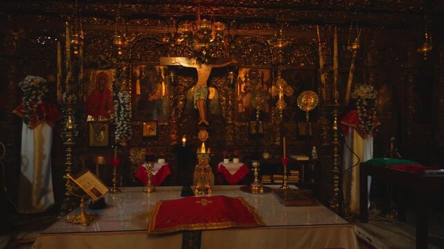 The richly decorated interior of an Orthodox church in Kissos village, Pelion, Thessaly, Greece. An elaborate iconostasis