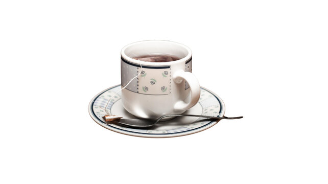 Cup of hot dark tea on decorative saucer with silver spoon tea time hot drink morning ritual tea break porcelain cup white background black tea shop beverage relaxation refreshing