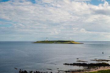 Vue de l'île de Pladda et son phare depuis Kildonan, île d'Arran, Ecosse © Pascal
