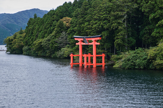 A Japanese Shinto shrine gate also known as a Torii on Lake Ashi