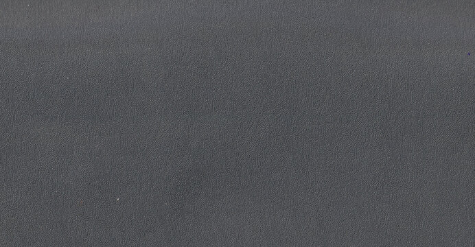 Dark gray textured book binding paper with a fine embossed grain pattern