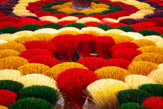 Colorful incense sticks in the craft village of Quang Phu Cau. Natural background.