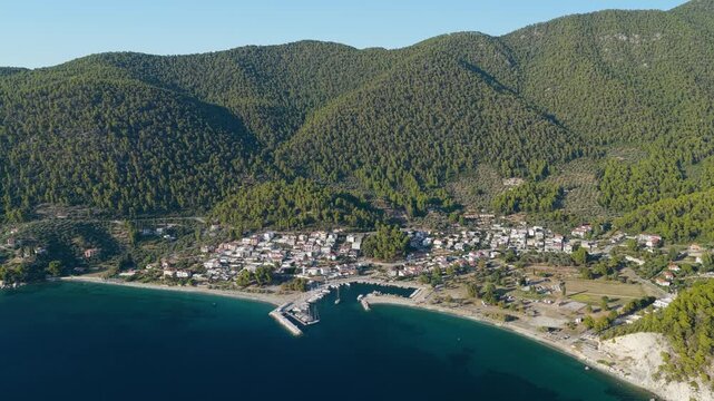 Aerial view of Neo Klima, a coastal village on Skopelos Island, Greece. The natural beauty and Mediterranean architecture typical of the Sporades islands
