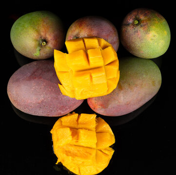 Mango cut slice on top of fruits