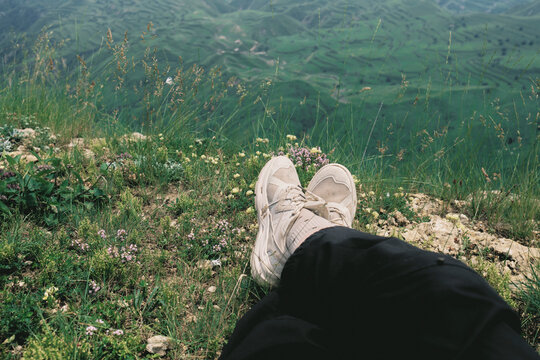 Feeling relaxed on a hillside in nature during daytime