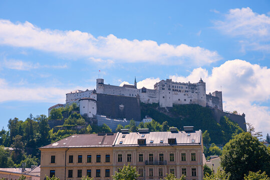 The historic Hohensalzburg Fortress towers over the city of Salzburg in Austria.