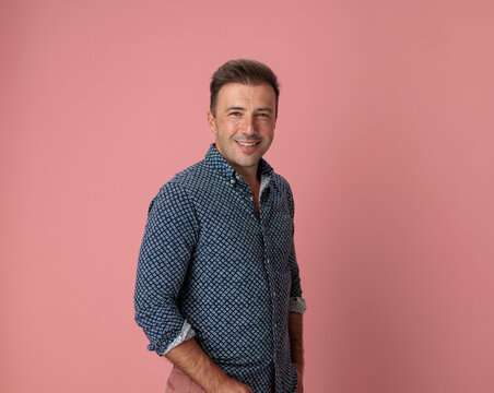 Confident man smiling while looking forward
